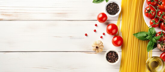 Poster - Italian food cooking concept with ingredients for preparing pasta spaghetti including tomatoes olive oil spices herbs green olives and tomato sauce placed on a rustic white wooden background This fla