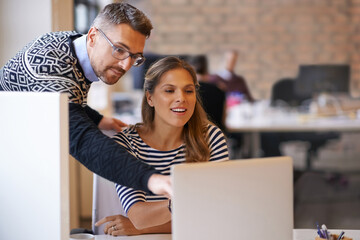 Fototapete - Discussion, manager and business people on laptop for help, feedback and training intern. Creative office, teamwork and man and woman on computer for online project, website and research for coaching