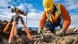 © ron - Geotechnical engineer wearing safety gear and conducting soil stability test in construction site.