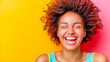 © João Macedo - Young woman is laughing with closed eyes on colorful background