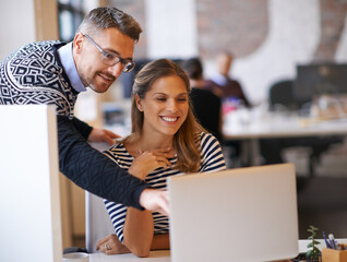 Fototapete - Meeting, manager and business people on laptop for help, feedback and training intern in office. Creative company, teamwork and man and woman on computer for online project, mentor and research