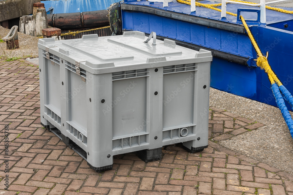 gray plastic storage container with closed lid