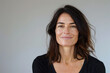 © MagnusCort - A close up portrait of a woman with a subtle smile