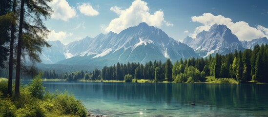 Poster - View of zugspitze with forrest and lake in foreground. Creative banner. Copyspace image