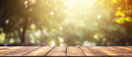 Poster - Empty top of wooden table with Abstract of bokeh and natural light of the summer season Vintage Style For product display and advertising and promotional purposes. Creative banner. Copyspace image