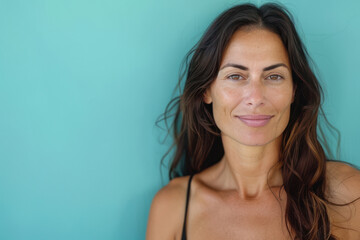 Wall Mural - A close up portrait of a woman with a subtle smile