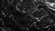 © Oleg - Crumpled Black Foil Texture Background for Modern Design Concepts