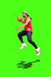 © STOCK PHOTO 4 U - Dynamic Action Shot of a Basketball Player in Mid-Air Against a Green Screen Background for Sports and Fitness Concepts