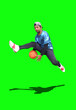 © STOCK PHOTO 4 U - Dynamic Action Shot of a Young Man Jumping with a Basketball Against a Green Screen Background