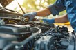 © spyrakot - Roadside Assistance Technician Inspecting Car Engine for Issues - Service and Maintenance Concept