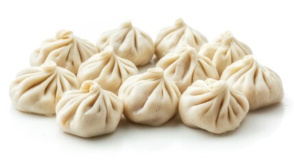 Canvas Print - Uncooked dumplings called khinkalis on a white background