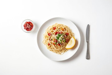 Wall Mural - Spaghetti with Tomato and Lemon on White Plate
