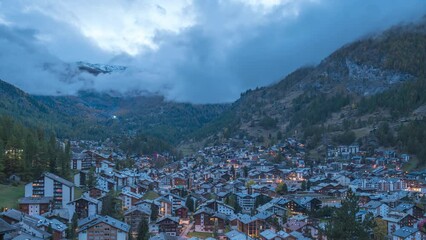 Sticker - Zermatt Switzerland time lapse, city skyline day to night timelapse at Zermatt city Valley and famous Matterhorn mountain peak