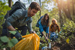 © Pattra - A group of environmental activists conducting a forest cleanup activity along the hiking trail, eco-friendly