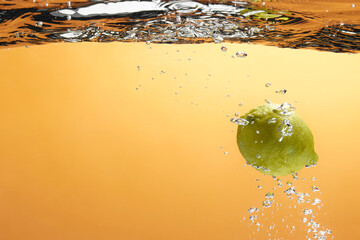 Wall Mural - Fresh fruit falling into the water.
Organic fruits for making effective juices for dieting.