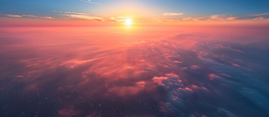 Poster - Aerial View of Sunset Over Clouds