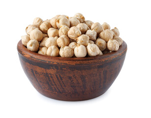 Wall Mural - Clay bowl full of chickpeas isolated on white background.