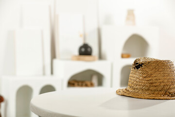 Sticker - White table of free space and summer hat. Empty space for your decoration. 