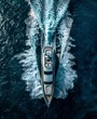 © Joyce - Aerial view of luxury yacht in sea water.