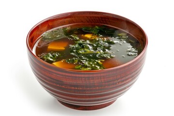 Wall Mural - Traditional Japanese miso soup with tofu and seaweed in a brown bowl on white background