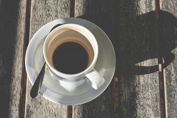 cup of coffee on wooden table 2