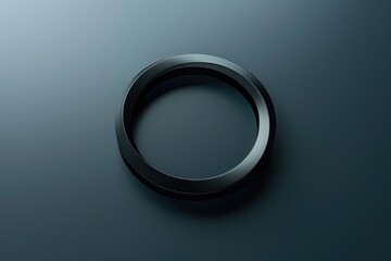 Poster - A close-up of a black circular object on a blue surface, with no context or surroundings