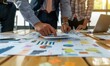 © Ibad - Business brain storm strategy ideas sharing hand paper document chart analysis close up,business people teamwork consult organize big data summary together conference meeting office