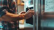 © Orxan - Man writing a to-do list on a refrigerator door in a kitchen, close-up