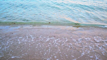 Wall Mural - gentle waves crashing on beach