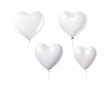 © tohceenilas - Four white heart-shaped balloons isolated on a black background. The balloons are various sizes and tied with red ribbons.
