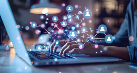 A businessman using a laptop, with social network connections and people icons displayed on the screen. The concept of digital marketing for business, human resources, and global customer network.