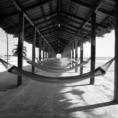 Wall Mural - Coastal Calm: An Empty Beach Pavilion with Sun-Bleached Wood Seating