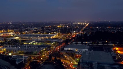 Wall Mural - Rush Hour Traffic On Congested Road And Highways At Night In Los Angeles California, USA. aerial, hyperlapse