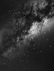 Wall Mural - a black and white photo of a galaxy with a lot of stars