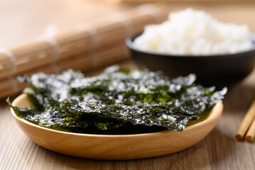 Wall Mural - Dried seaweed sheet eating with rice, Asian food