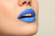 © New Africa - Woman wearing blue lipstick on light background, closeup. Space for text