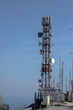 © Wirestock - Tall cell tower with multiple antennas on top