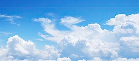 Poster - The image features a captivating abstract background of blue sky and clouds providing ample space for additional content