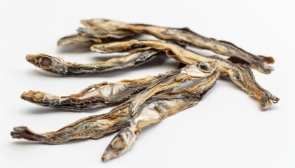 Crunchy Dried Anchovies: A Close-Up View on a Clean White Background