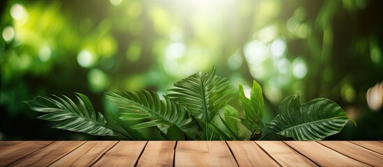 Aufkleber - Tropical leaves embellish an empty wooden table with a blurred background serving as a copy space image for product presentation and the option to add text