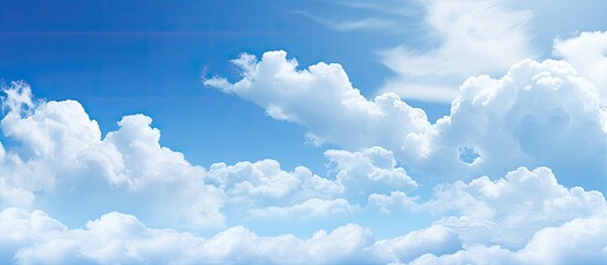 Poster - The image features a captivating abstract background of blue sky and clouds providing ample space for additional content