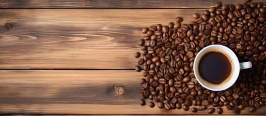 Aufkleber - Top view copy space image of a wooden background with a coffee cup and coffee beans
