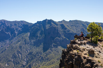 Wall Mural - Young woman summit to Bejenado Peak in Caldera de Taburiente, La Palma, Spain