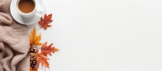 Poster - Top view of a cozy autumn-themed arrangement including a cup of coffee, sweater, plaid, and fall leaves against a white backdrop with space for text or images. with copy space image