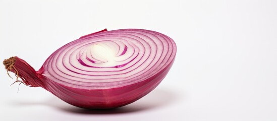 Leinwandbilder - Red onion slice on a white backdrop with copy space image.