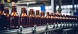 © vxnaghiyev - A beverage factory production line with a conveyor belt holding bottles illustrates the food and drink manufacturing process with copy space image.
