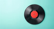 © kitti - vinyl record on a green background and copy space