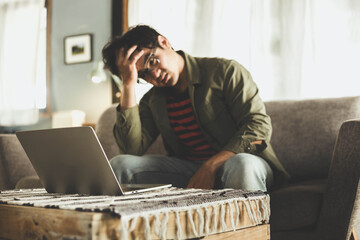 sad depression serious people from work,study stress problem.asian man feeling tired suffering using computer working work place.concept global economic,health problems