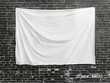 © Sawoon - Hanging plain white blank canvas tapestry fabric POD product mockup black brick wall building dark background cozy rustic modern sign blanket art cloth textile template design large backdrop front