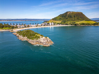 Wall Mural - aerial shot of dormant volcano in beach town of mount maunganui, new zealand